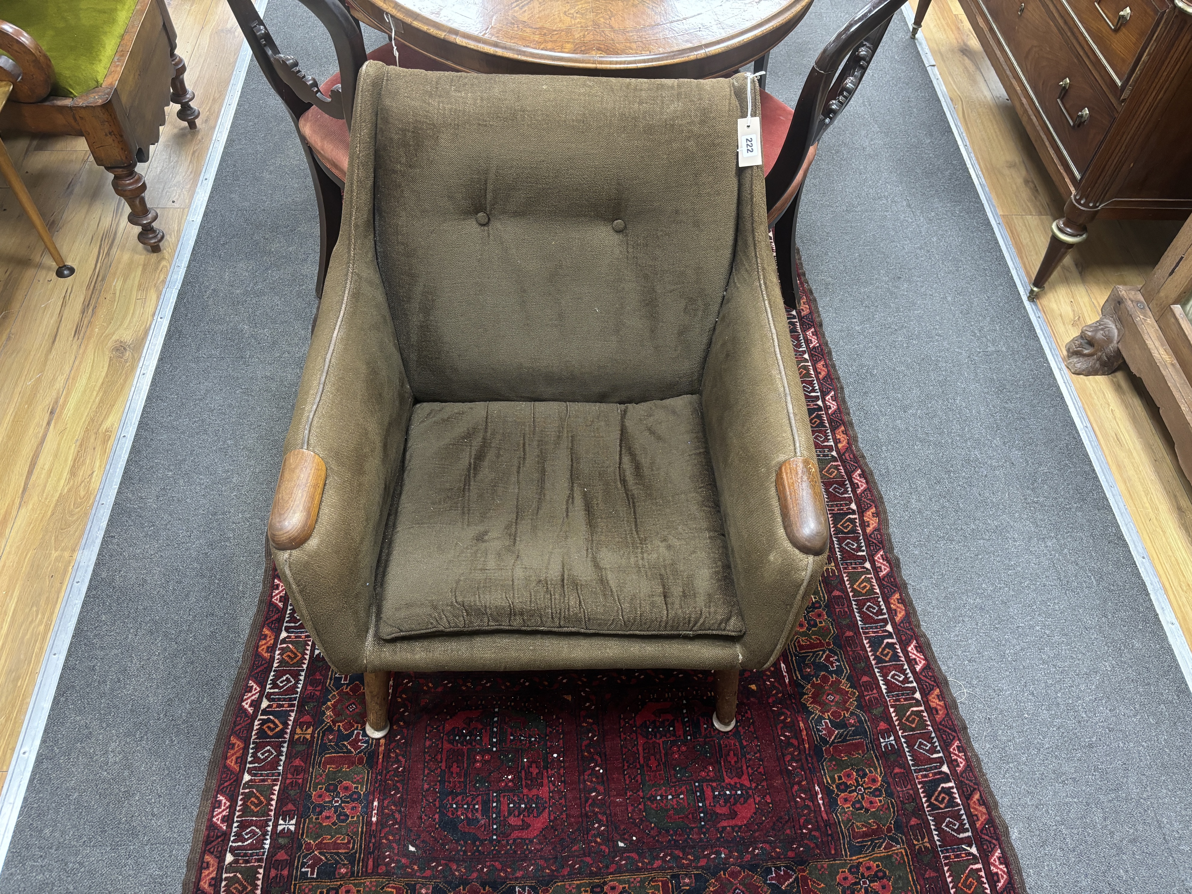 In the manner of Hans Wegner, a Danish style upholstered lounge chair, width 74cm, depth 68cm, height 74cm